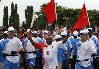 Cover image for  article: Carrying The Torch: The Political Tightrope; The Olympic Games Under Fire; The Yahoo! & The Restless - Media Biz Buzz for April 14, 2008