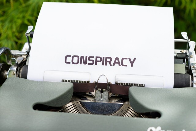 Cover image for article: The Weaponization of the Term "Conspiracy Theorist"