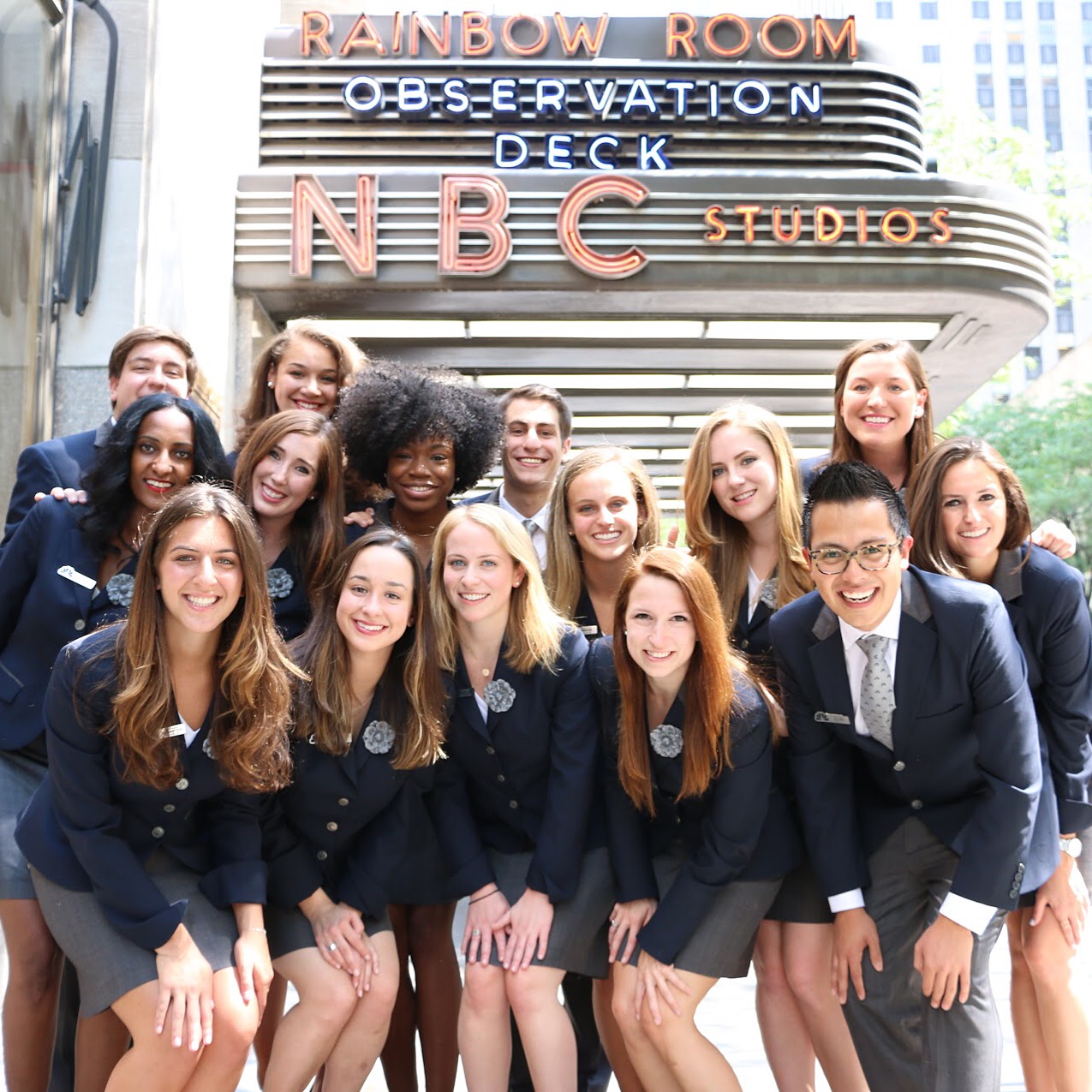 Desiree, center left, and her 2016 NBCUniversal Page Program cohort in front of the infamous Rainbow Room entrance.