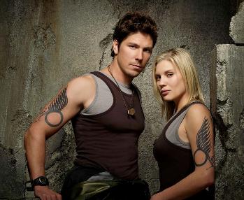 Michael Trucco as Sam Anders and Katee Sackhoff as " Kara "Starbuck" Trace in "Battlestar Galactica"